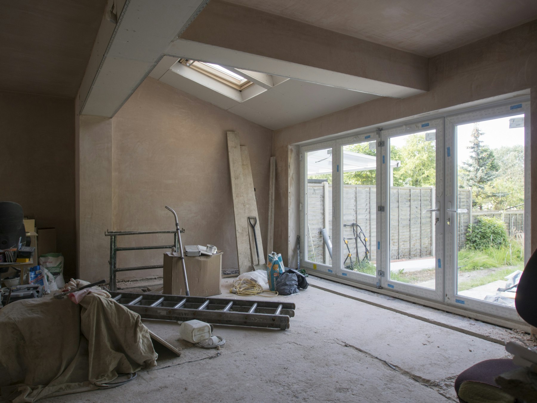 a room that is being remodeled with a skylight